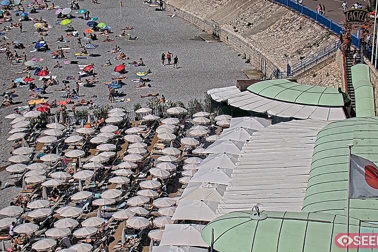 Webcam view of the Castel beach and club on the eastern-most side of the Promenade des Anglais and nestled under the Parc du Chateau, in Nice, France