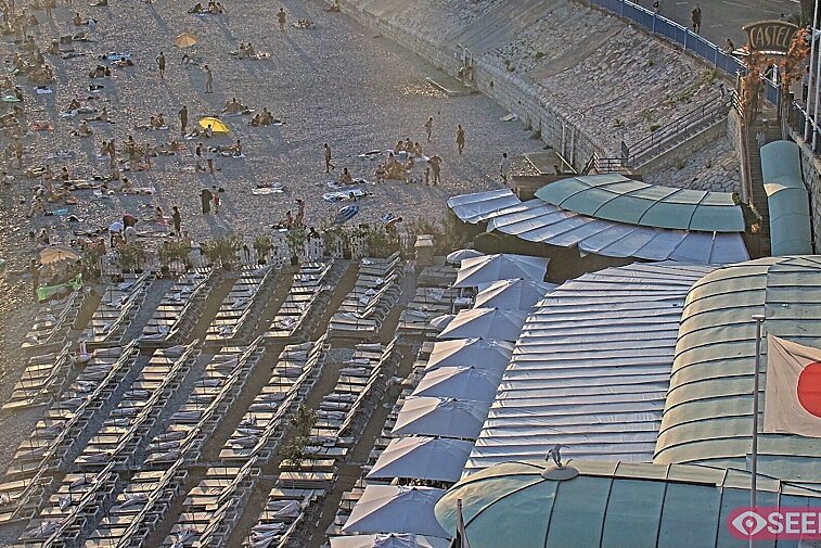 Webcam view of the Castel beach and club on the eastern-most side of the Promenade des Anglais and nestled under the Parc du Chateau, in Nice, France