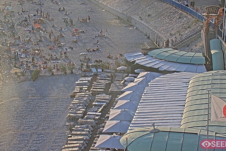 Webcam view of the Castel beach and club on the eastern-most side of the Promenade des Anglais and nestled under the Parc du Chateau, in Nice, France