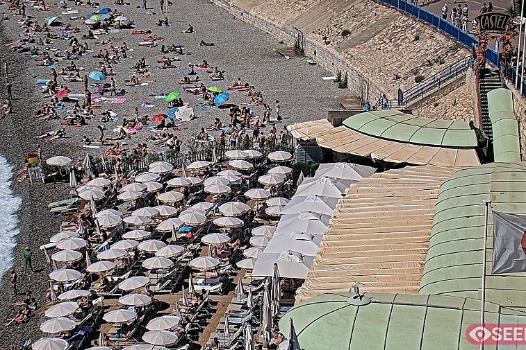 Webcam view of the Castel beach and club on the eastern-most side of the Promenade des Anglais and nestled under the Parc du Chateau, in Nice, France