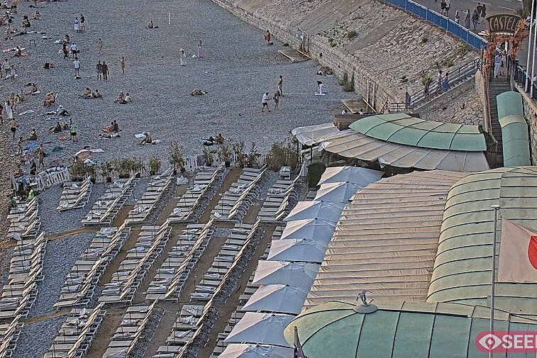 Webcam view of the Castel beach and club on the eastern-most side of the Promenade des Anglais and nestled under the Parc du Chateau, in Nice, France