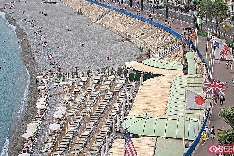 Webcam view of the Castel beach and club on the eastern-most side of the Promenade des Anglais and nestled under the Parc du Chateau, in Nice, France