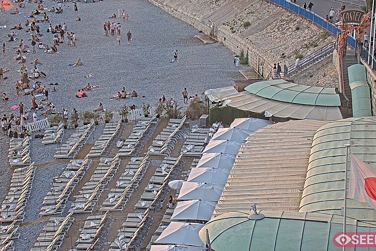 Webcam view of the Castel beach and club on the eastern-most side of the Promenade des Anglais and nestled under the Parc du Chateau, in Nice, France