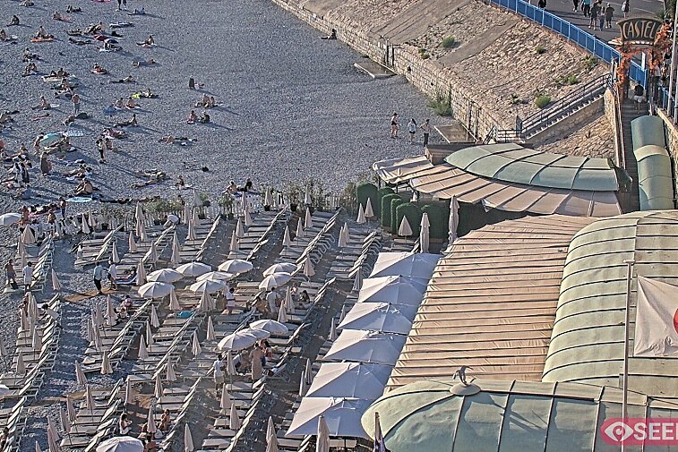 Webcam view of the Castel beach and club on the eastern-most side of the Promenade des Anglais and nestled under the Parc du Chateau, in Nice, France