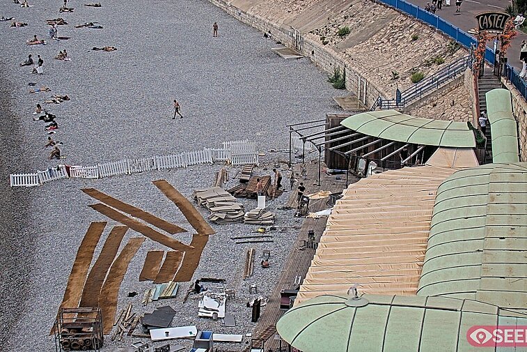 Webcam view of the Castel beach and club on the eastern-most side of the Promenade des Anglais and nestled under the Parc du Chateau, in Nice, France
