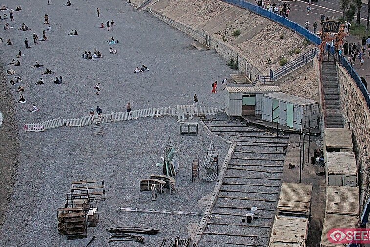 Webcam view of the Castel beach and club on the eastern-most side of the Promenade des Anglais and nestled under the Parc du Chateau, in Nice, France