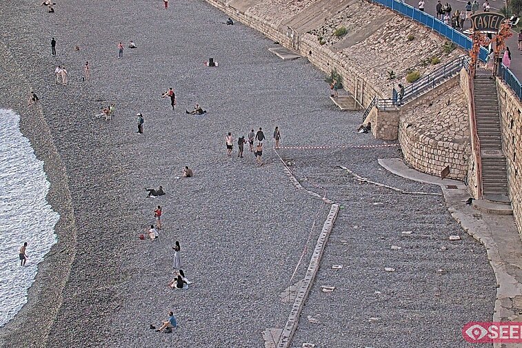 Webcam view of the Castel beach and club on the eastern-most side of the Promenade des Anglais and nestled under the Parc du Chateau, in Nice, France