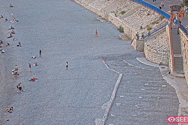Webcam view of the Castel beach and club on the eastern-most side of the Promenade des Anglais and nestled under the Parc du Chateau, in Nice, France