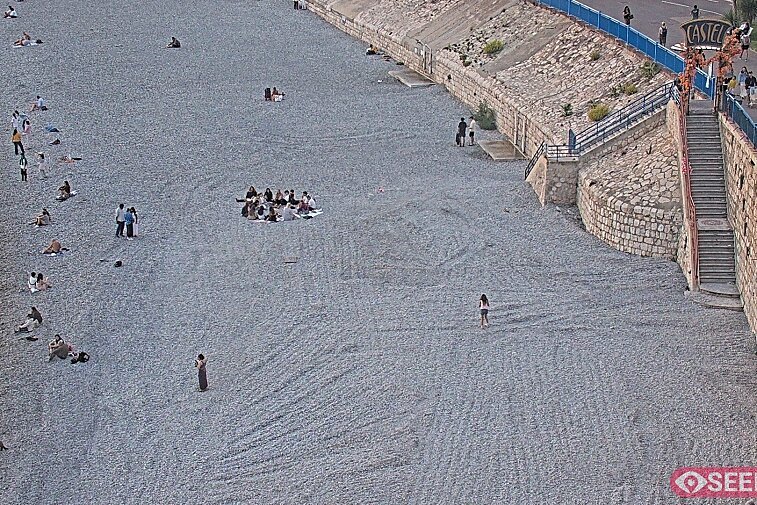 Webcam view of the Castel beach and club on the eastern-most side of the Promenade des Anglais and nestled under the Parc du Chateau, in Nice, France
