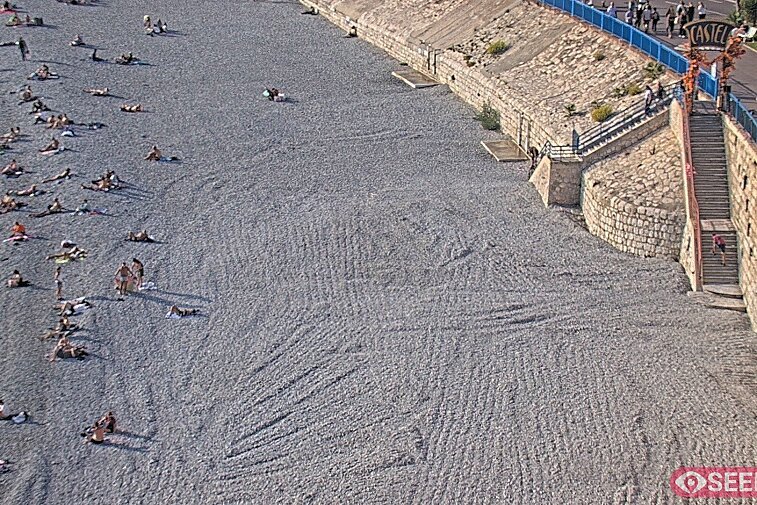 Webcam view of the Castel beach and club on the eastern-most side of the Promenade des Anglais and nestled under the Parc du Chateau, in Nice, France