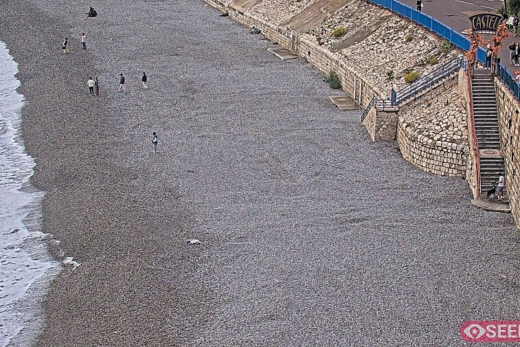 Webcam view of the Castel beach and club on the eastern-most side of the Promenade des Anglais and nestled under the Parc du Chateau, in Nice, France