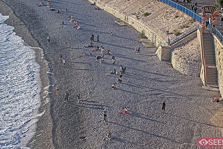 Webcam view of the Castel beach and club on the eastern-most side of the Promenade des Anglais and nestled under the Parc du Chateau, in Nice, France