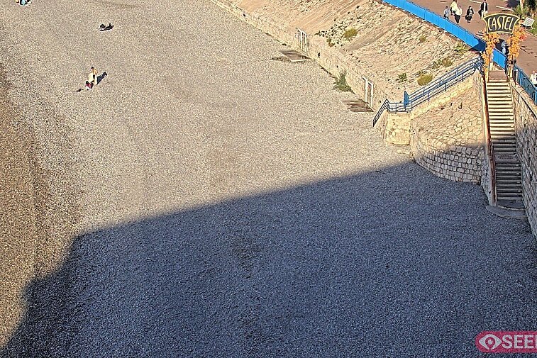 Webcam view of the Castel beach and club on the eastern-most side of the Promenade des Anglais and nestled under the Parc du Chateau, in Nice, France