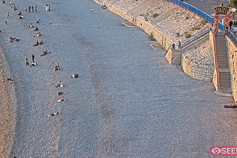 Webcam view of the Castel beach and club on the eastern-most side of the Promenade des Anglais and nestled under the Parc du Chateau, in Nice, France