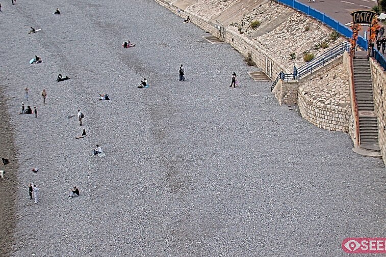 Webcam view of the Castel beach and club on the eastern-most side of the Promenade des Anglais and nestled under the Parc du Chateau, in Nice, France