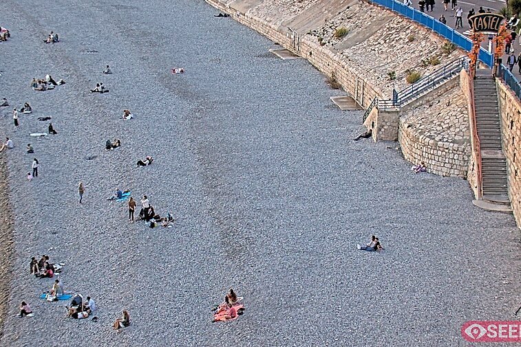 Webcam view of the Castel beach and club on the eastern-most side of the Promenade des Anglais and nestled under the Parc du Chateau, in Nice, France