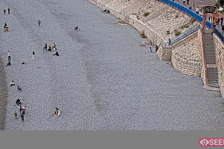 Webcam view of the Castel beach and club on the eastern-most side of the Promenade des Anglais and nestled under the Parc du Chateau, in Nice, France
