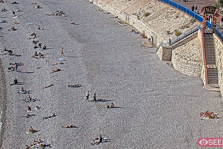 Webcam view of the Castel beach and club on the eastern-most side of the Promenade des Anglais and nestled under the Parc du Chateau, in Nice, France