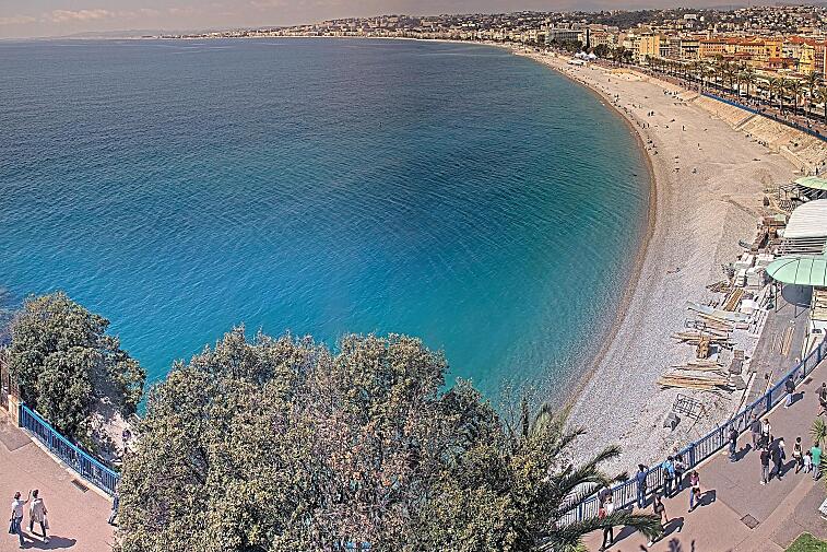 This webcam view from the Hotel Suisse in Nice, France, overlooks the Promenade des Anglais and its beach