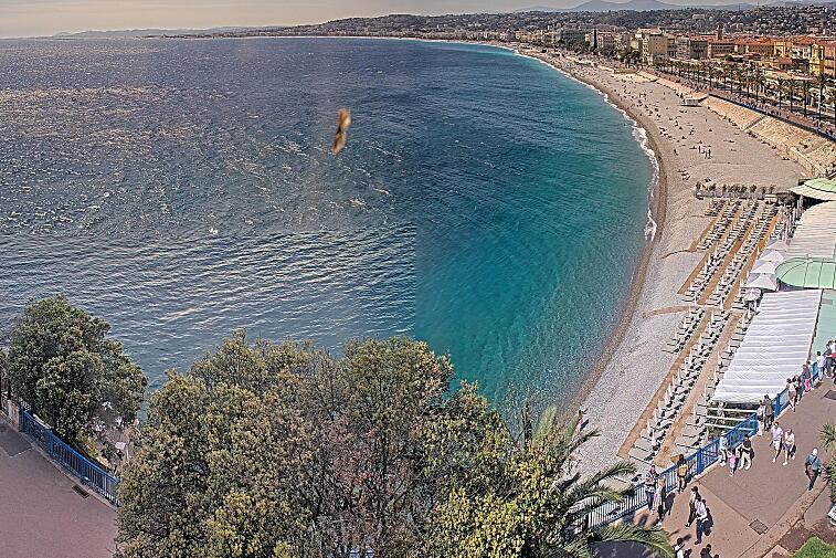 This webcam view from the Hotel Suisse in Nice, France, overlooks the Promenade des Anglais and its beach