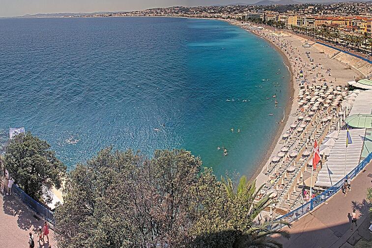 This webcam view from the Hotel Suisse in Nice, France, overlooks the Promenade des Anglais and its beach
