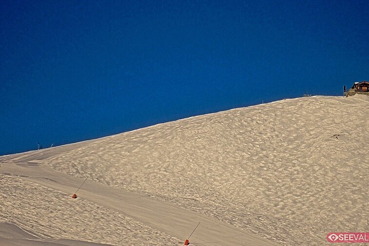 A view of the ski area at the top of La Daille, near the Tommeuses chairlift