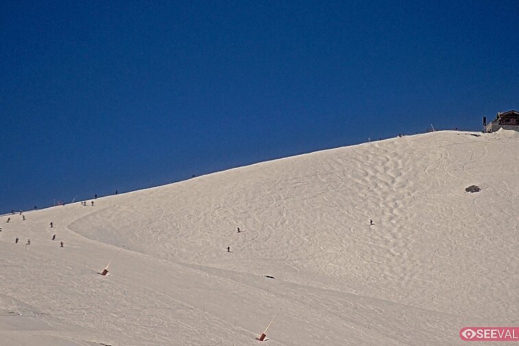 A view of the ski area at the top of La Daille, near the Tommeuses chairlift