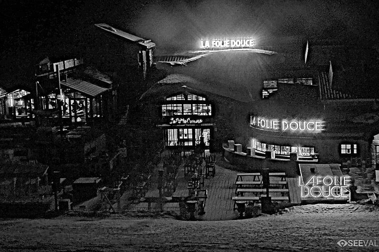View of La Folie Douce restaurant in the ski area above La Daille in Val d'Isere.  From 2PM when the weather is good, see live musicians and the apres-ski party.
