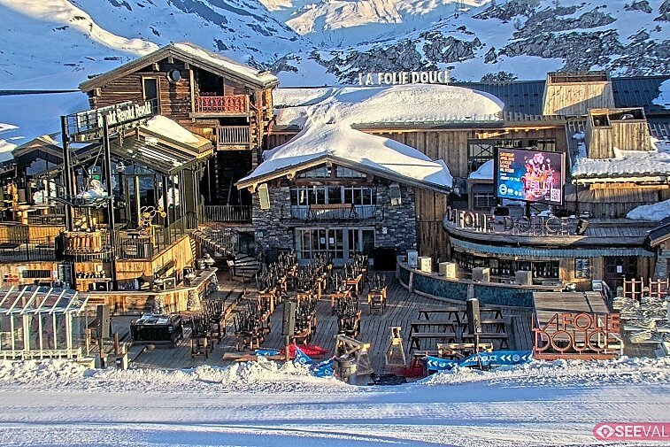View of La Folie Douce restaurant in the ski area above La Daille in Val d'Isere.  From 2PM when the weather is good, see live musicians and the apres-ski party.