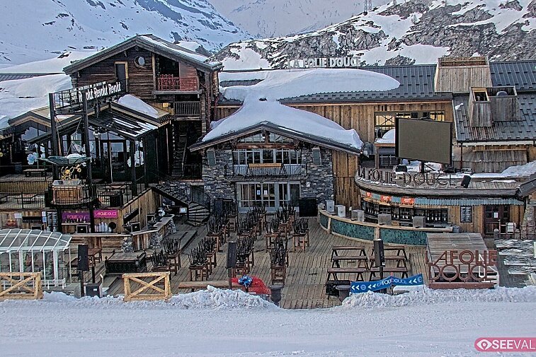 View of La Folie Douce restaurant in the ski area above La Daille in Val d'Isere.  From 2PM when the weather is good, see live musicians and the apres-ski party.
