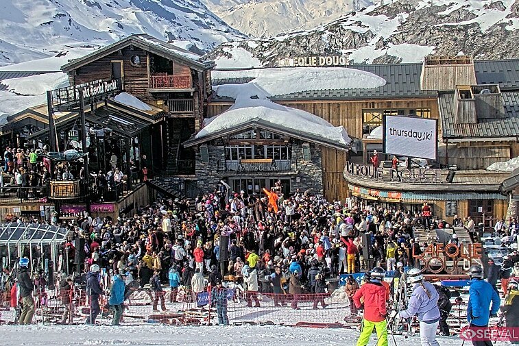 View of La Folie Douce restaurant in the ski area above La Daille in Val d'Isere.  From 2PM when the weather is good, see live musicians and the apres-ski party.