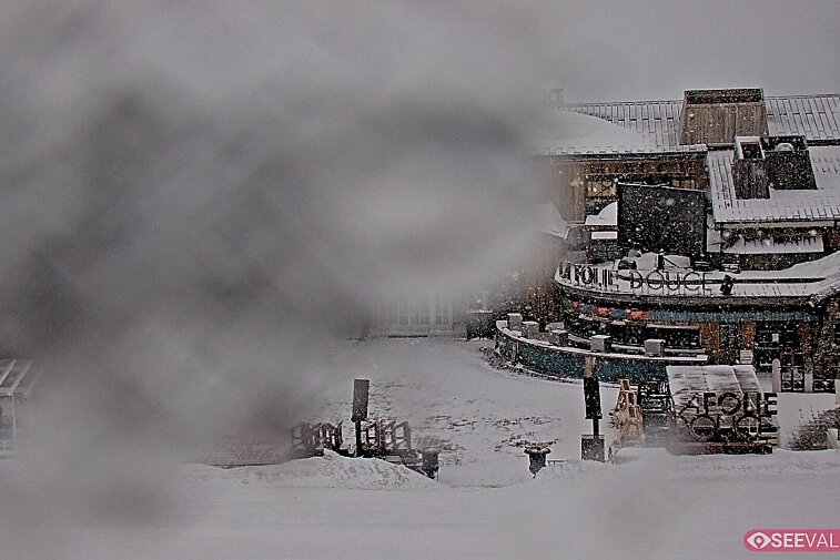 View of La Folie Douce restaurant in the ski area above La Daille in Val d'Isere.  From 2PM when the weather is good, see live musicians and the apres-ski party.