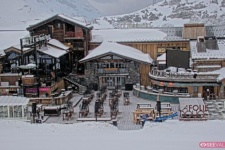 View of La Folie Douce restaurant in the ski area above La Daille in Val d'Isere.  From 2PM when the weather is good, see live musicians and the apres-ski party.