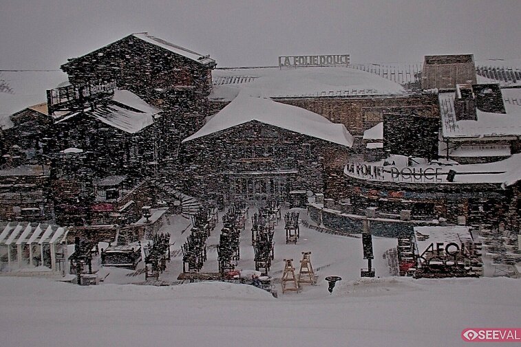 View of La Folie Douce restaurant in the ski area above La Daille in Val d'Isere.  From 2PM when the weather is good, see live musicians and the apres-ski party.