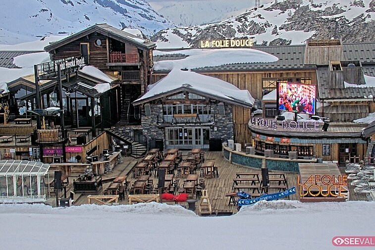 View of La Folie Douce restaurant in the ski area above La Daille in Val d'Isere.  From 2PM when the weather is good, see live musicians and the apres-ski party.