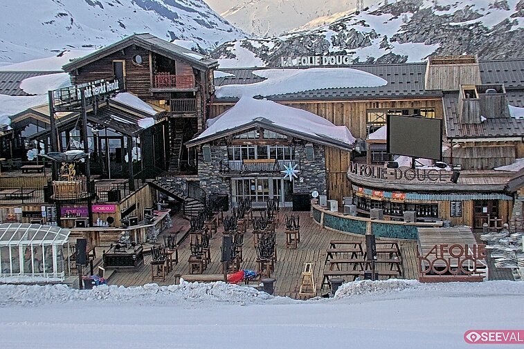 View of La Folie Douce restaurant in the ski area above La Daille in Val d'Isere.  From 2PM when the weather is good, see live musicians and the apres-ski party.
