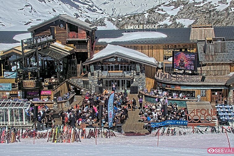 View of La Folie Douce restaurant in the ski area above La Daille in Val d'Isere.  From 2PM when the weather is good, see live musicians and the apres-ski party.