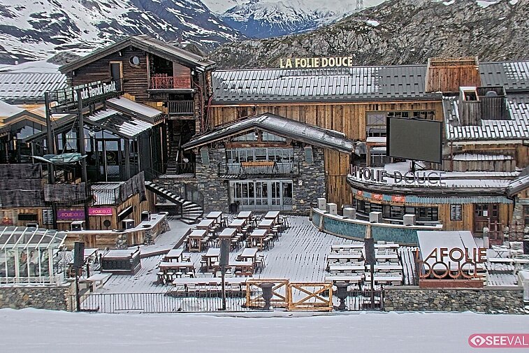View of La Folie Douce restaurant in the ski area above La Daille in Val d'Isere.  From 2PM when the weather is good, see live musicians and the apres-ski party.