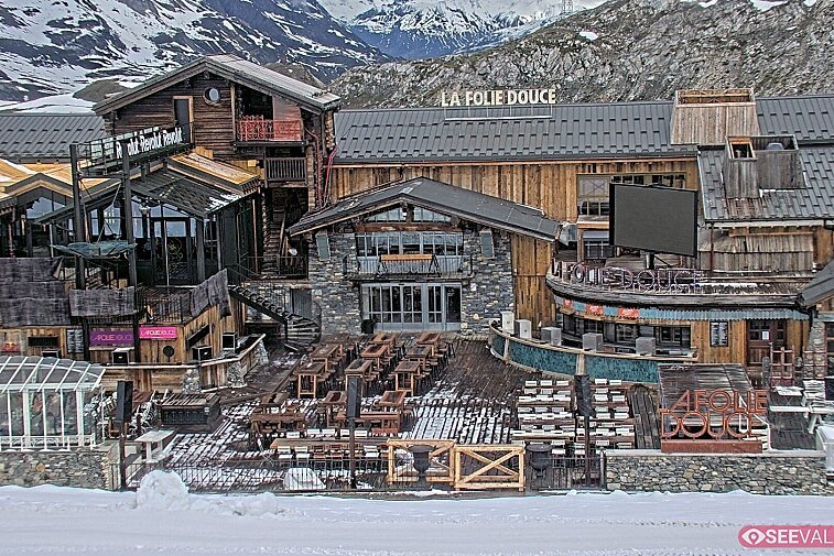 View of La Folie Douce restaurant in the ski area above La Daille in Val d'Isere.  From 2PM when the weather is good, see live musicians and the apres-ski party.