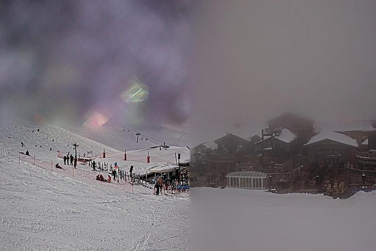 A webcam view of the Val d'Isere ski area above La Daille, near the Tommeuses chairlift.  The building in the centre is the renowned La Folie Douce restaurant.