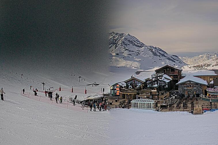 A webcam view of the Val d'Isere ski area above La Daille, near the Tommeuses chairlift.  The building in the centre is the renowned La Folie Douce restaurant.
