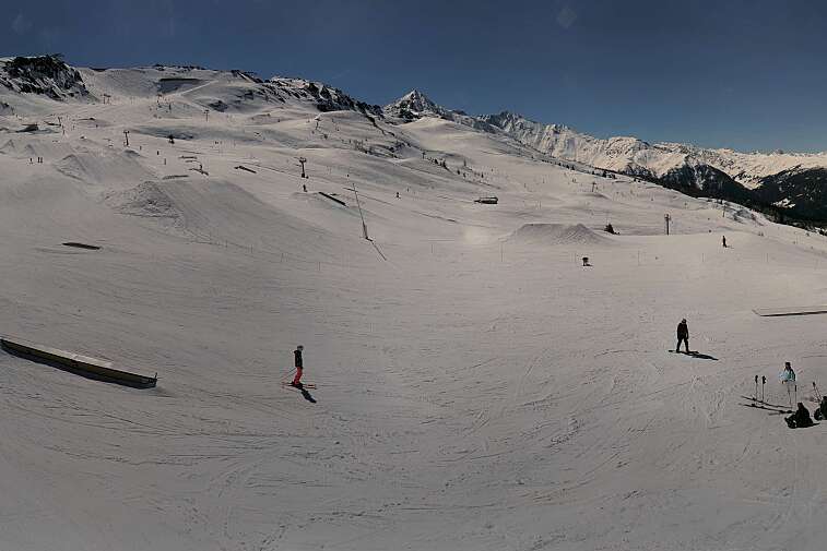 Freestyle action from the Les Arcs snowpark from this webcam at 2150m