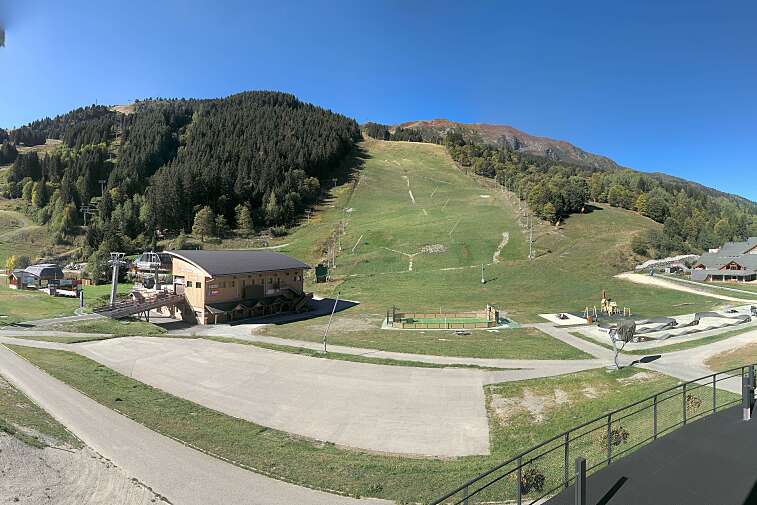 Webcam view of La Chaudanne, the central lift station for Meribel, with Meribel just visible in the background