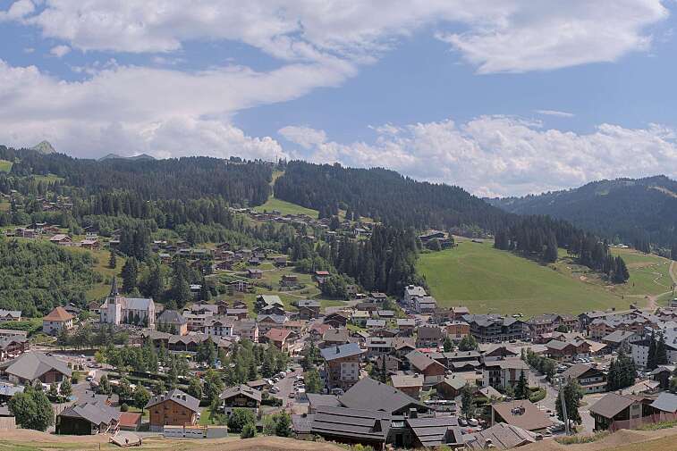 This is a delightful view of Les Gets village with ski areas in the background.