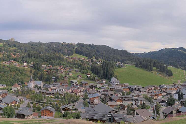 This is a delightful view of Les Gets village with ski areas in the background.